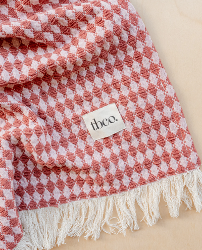 TBCo. Pink Argyle Diamond Cotton Throw